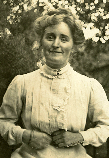 Annie Wyatt in garden c1914_NATIONAL TRUST ARCHIVES_369x532